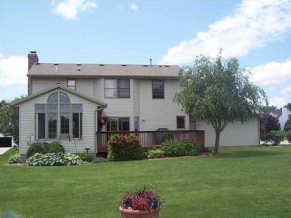 Back of home-Huge 4-Season Room-Neutral Decor