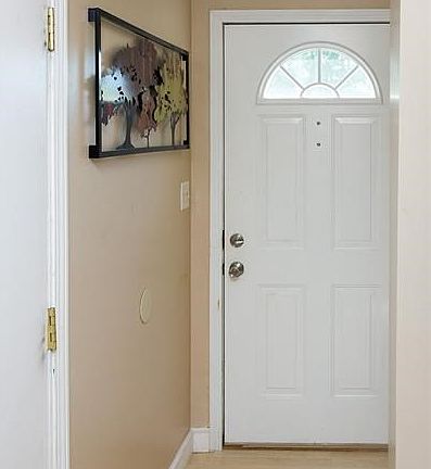 Upon entry you are greeted with a large foyer/mudroom with garage access.
