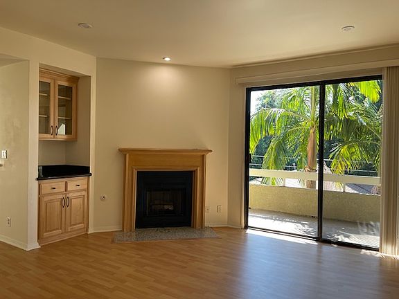 Living room facing south side balcony