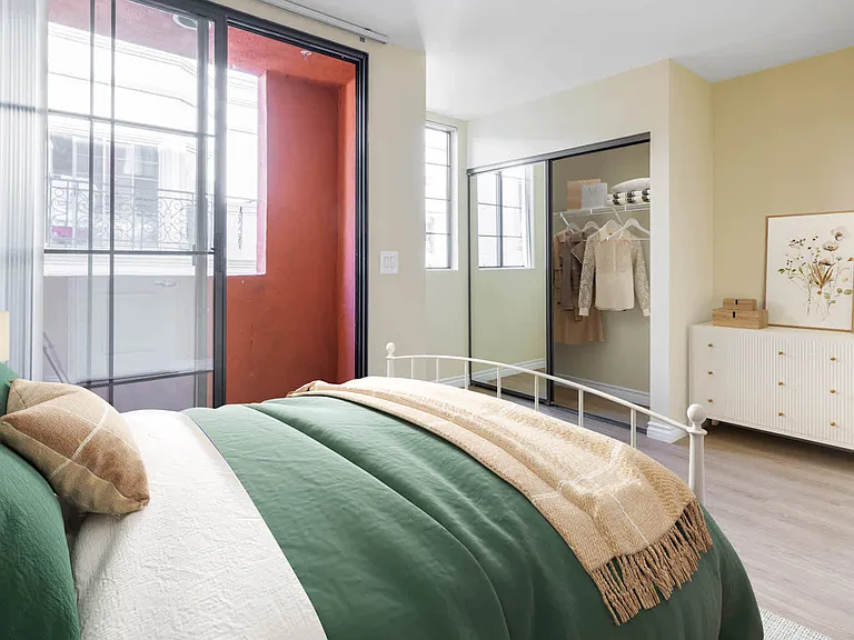 Bedroom with Balcony and Hard Surface Flooring
