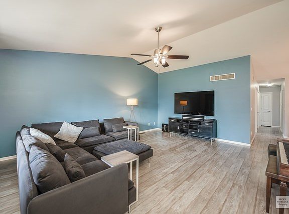 The entire main level has newer, high quality wood laminate flooring.