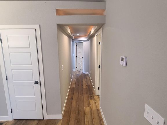 hallway to bedrooms and main bathroom