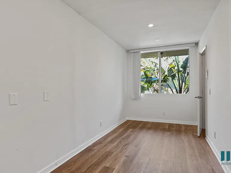Bedroom with Windows, Vinyl Flooring, and Recessed Lighting