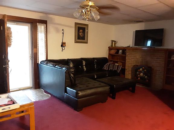 Couch sits 5 people. The TV is included.