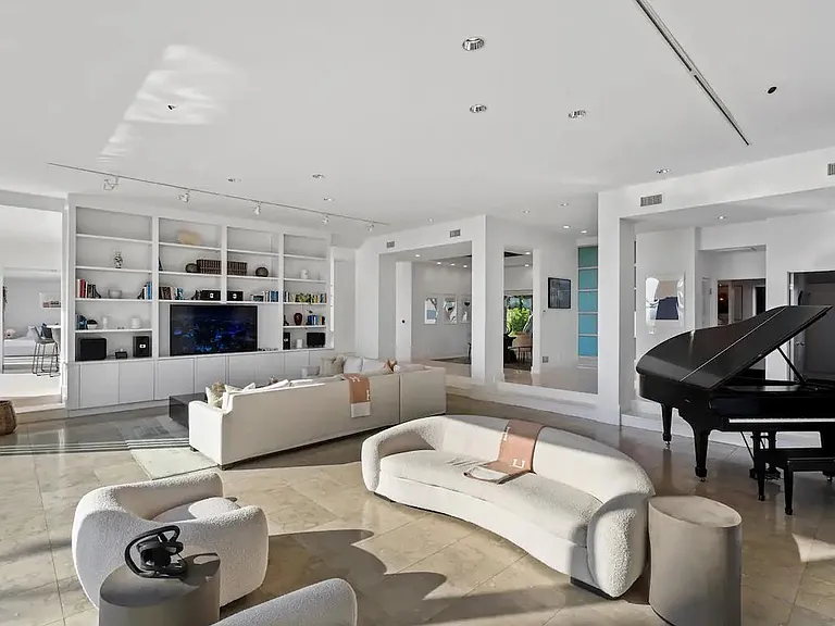 A Grand Piano in the Living Area invites you to indulge in musical moments while surrounded by the luxurious ambiance.