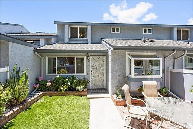 Welcome home! Elevated, private, spacious and gated front yard! Energy efficient windows, lots of li