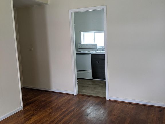 View into kitchen from living/bedroom area