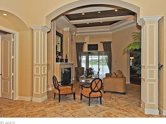 Notice all the custom finishes & ceiling detail.