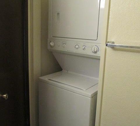 full size washer/dryer in each unit