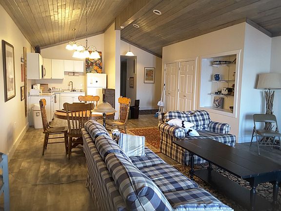 Open floor plan with vaulted ceilings.