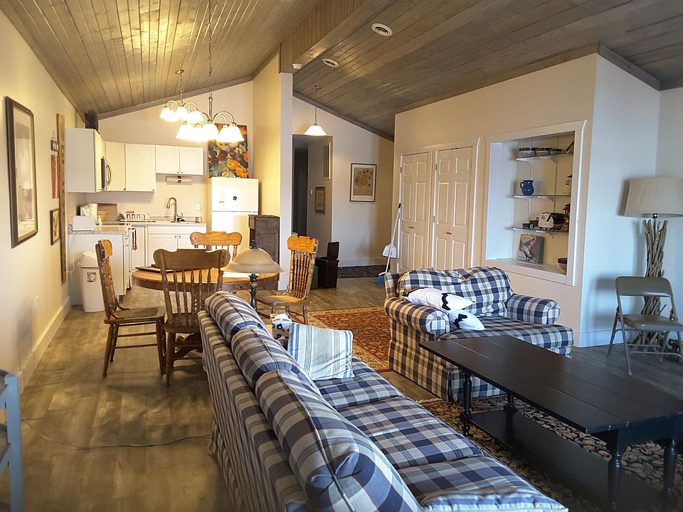 Open floor plan with vaulted ceilings.