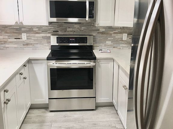 2nd image of 611 SW South River Dr APT 104