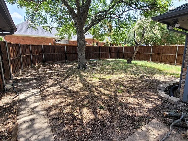 Fenced in yard with tons of shade!