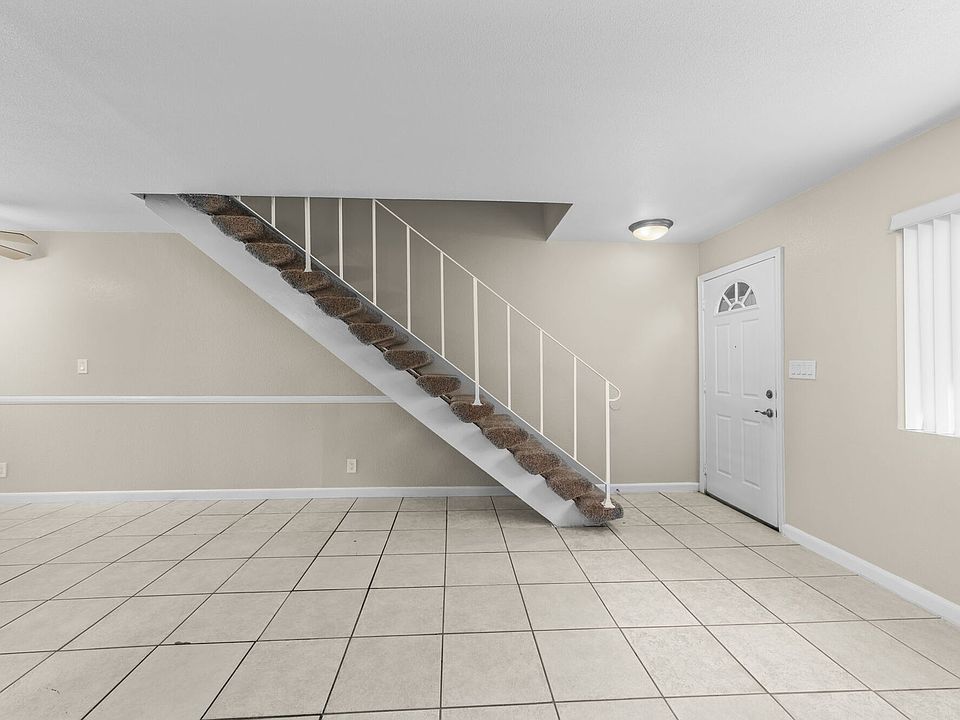 Unit living space at Olive Tree Townhomes in Costa Mesa, CA