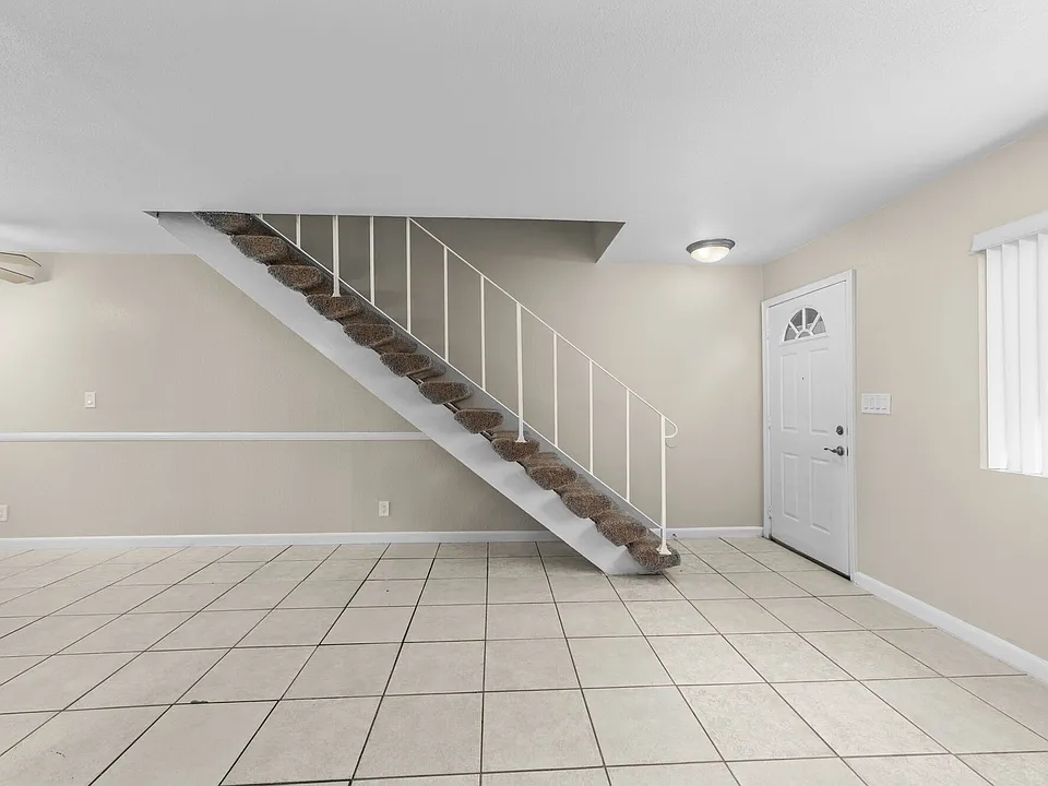Unit living space at Olive Tree Townhomes in Costa Mesa, CA