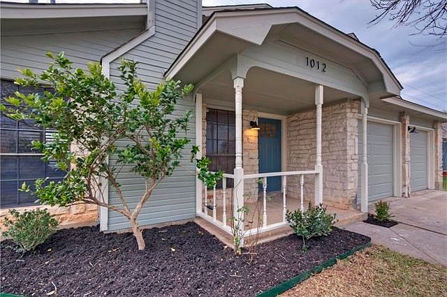 Front entrance to home with covered patio