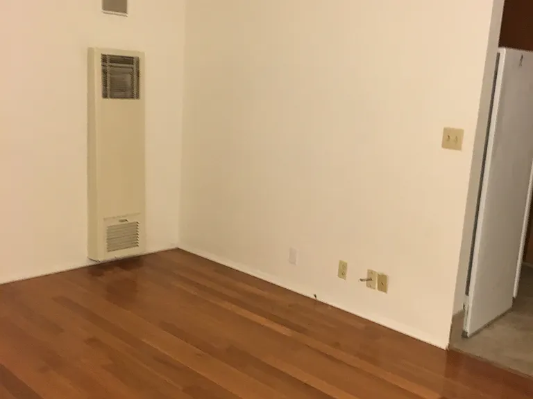 living room floor and gas heater