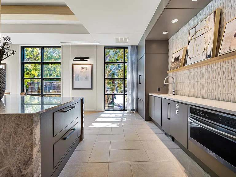 Catering kitchen with quartz counters and modern cabinetry