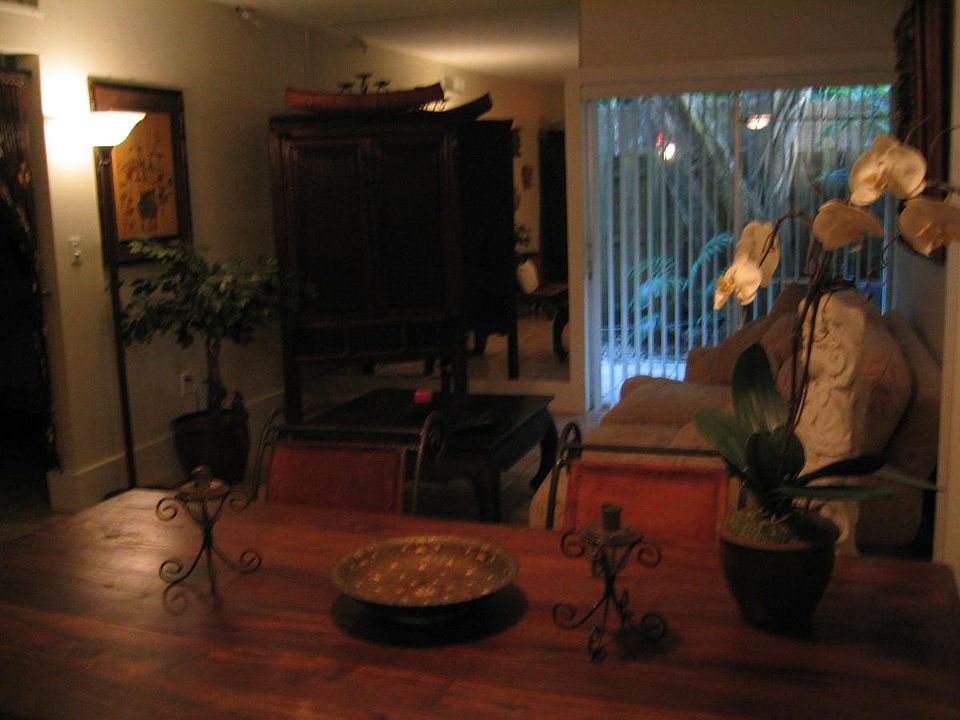 Living room with view of private patio