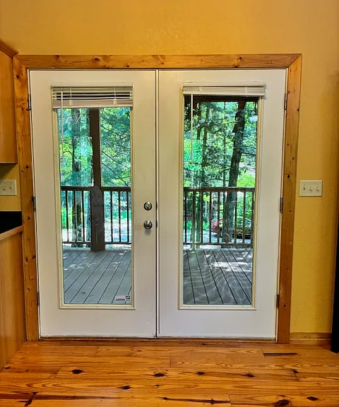 Dining area and rear porch access with double doors