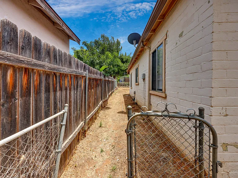 Looking from street at right side of yard