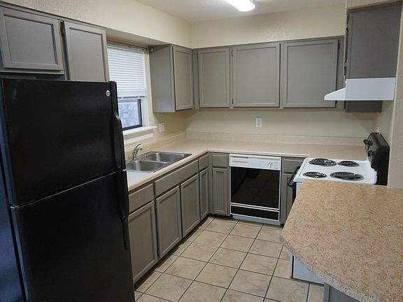 Kitchen is fully equipped with an oven, dishwasher, fridge, and a large sink that has a disposal!