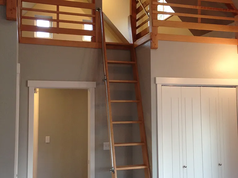 View of loft in primary bedroom