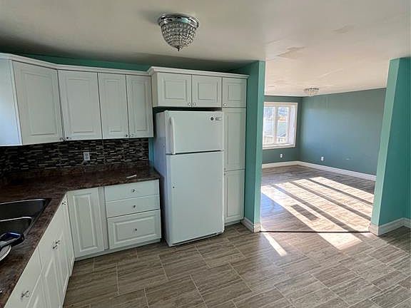 4th image of 7-9 Holmes Road