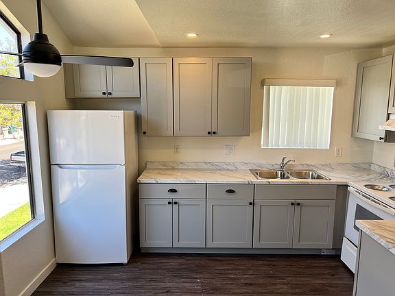 Another view of remodeled kitchen with ceiling fan.
