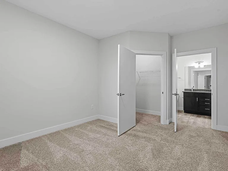 The Ave Apartments showcase bright interiors with large windows and sliding glass doors that open to private balconies, connecting you to Clintonville's vibrant surroundings. The Ave Apartments showcase bright interiors with large windows and sliding glas