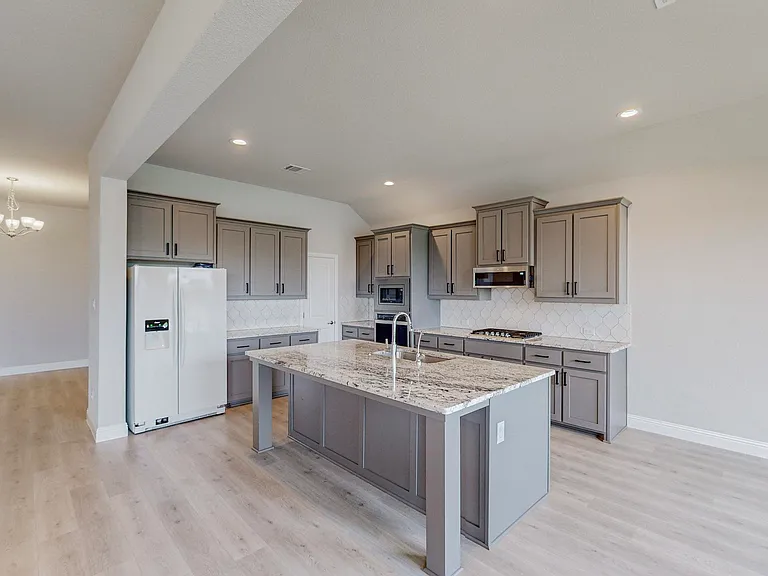 Yes, that door is a pantry! And yes, the refrigerator is included so you don't have to worry about purchasing and moving one of your own