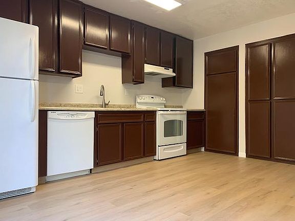 Ample storage and all major appliances included in this spacious dine-in kitchen area.