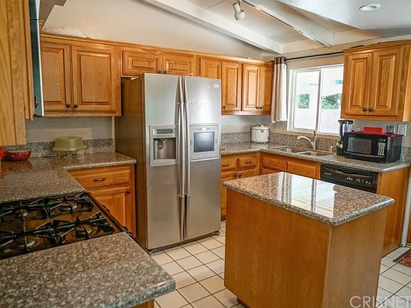 Upgraded kitchen with granite and newer cabinets