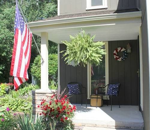 Ready and waiting! The front porch is nothing short of welcoming.