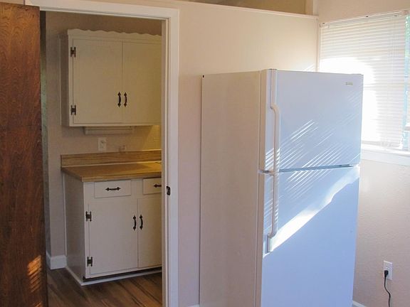 Back kitchen/eating area or small bedroom.