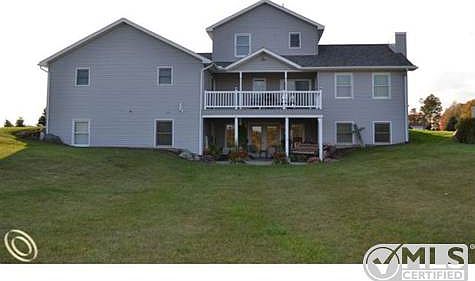 Rear with Deck and LL Patio.JPG