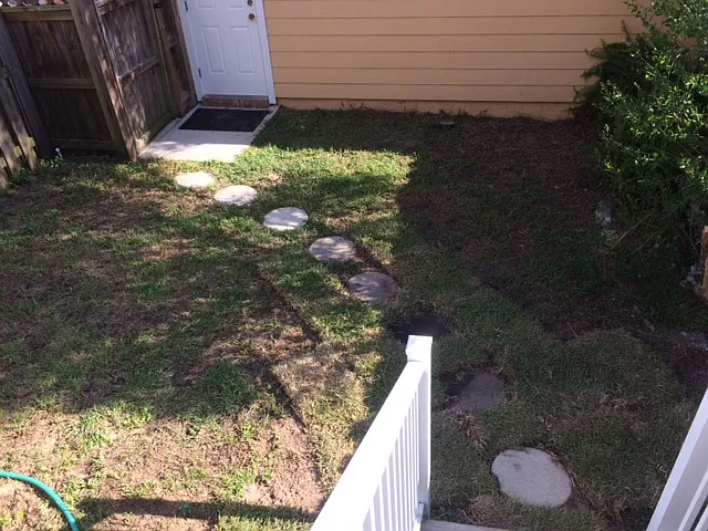 Back Yard to Two-Car Garage