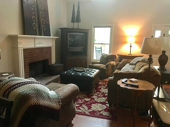 Great room has fireplace with gas logs