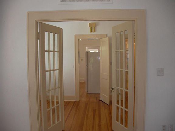 Back to front door through living room, dining room into kit