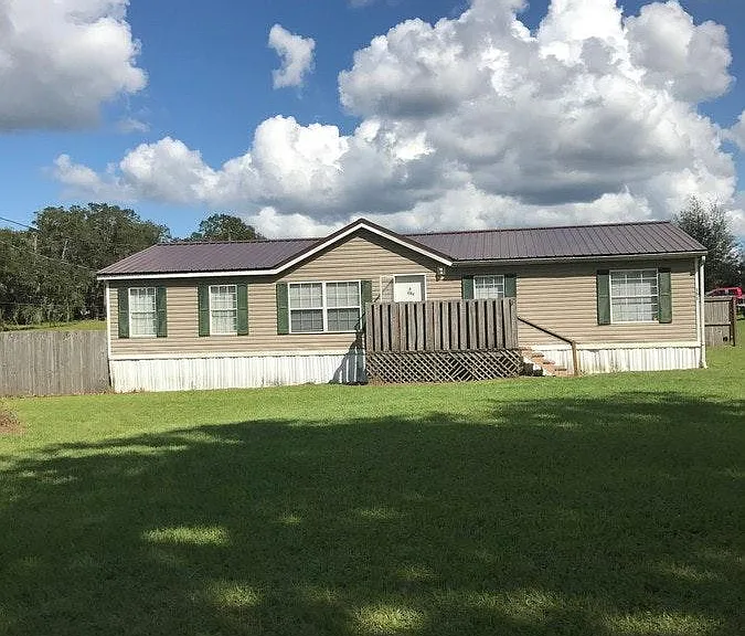 151 SE Shady Oaks Loop — Photo 1