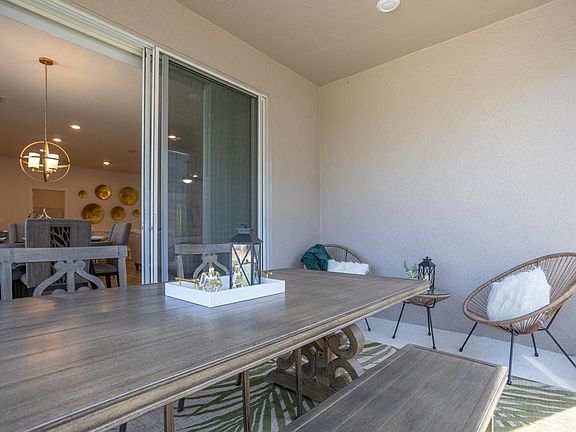 Your living space extends outdoors to a covered lanai - Shelby by Highland Homes