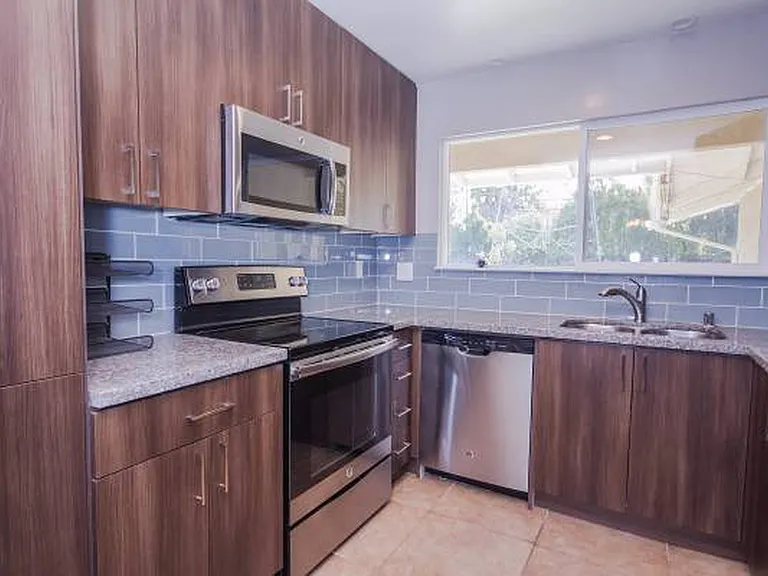 Kitchen with stainless steel appliances.