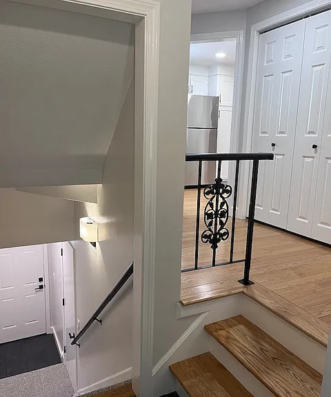 Rear access to parking lot and private garage