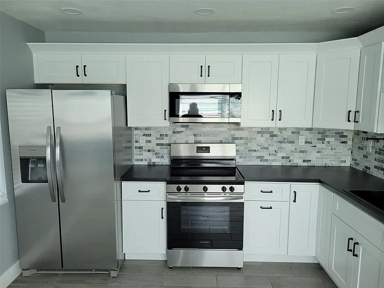 7650 Coquina Way #1 — Photo 2
