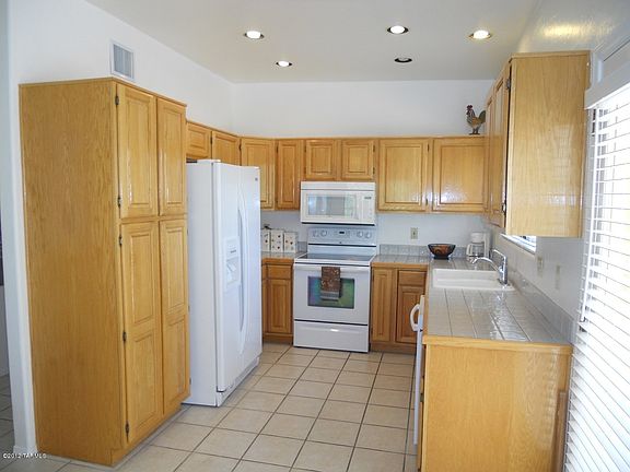 4th image of 9875 W Sumter Creek Pl