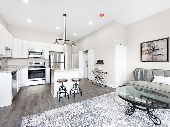 Kitchen and living space of studio