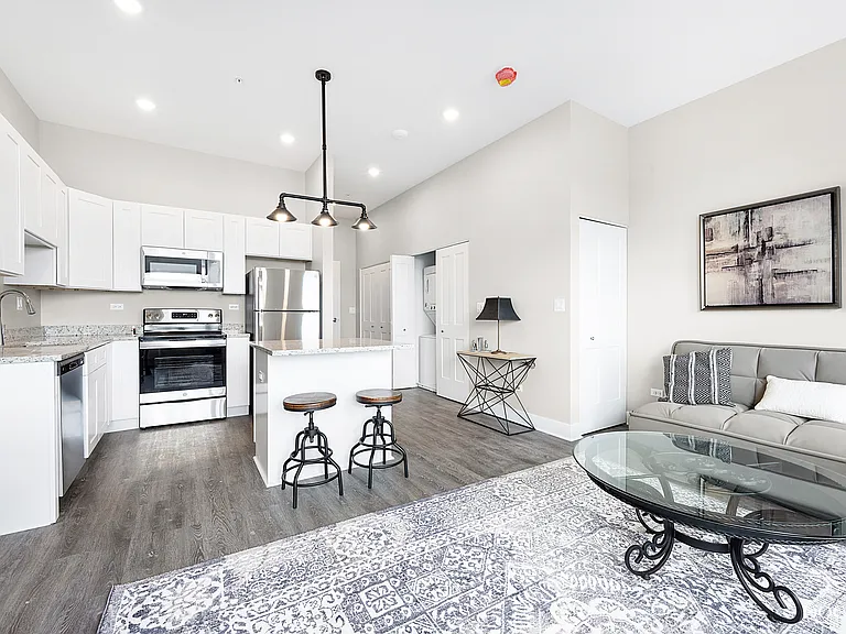 Kitchen and living space of studio