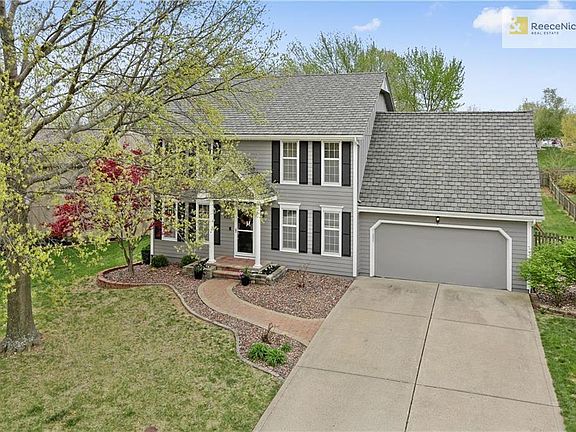 The exterior of this home has been freshly painted and has a 50-year composition roof