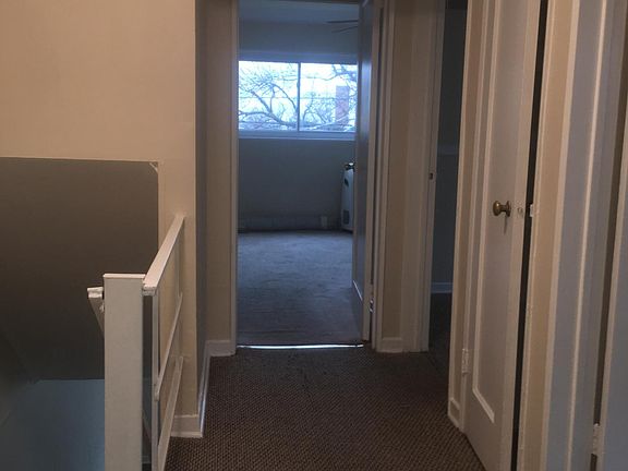 upstairs hallway looking from bathroom to the master bedroom