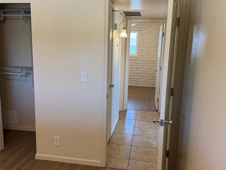 Looking down the hallway from bedroom #1